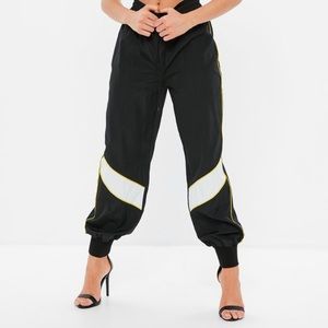 black shell suit color block binding joggers